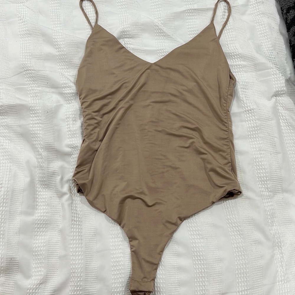 Size large nude body suit!